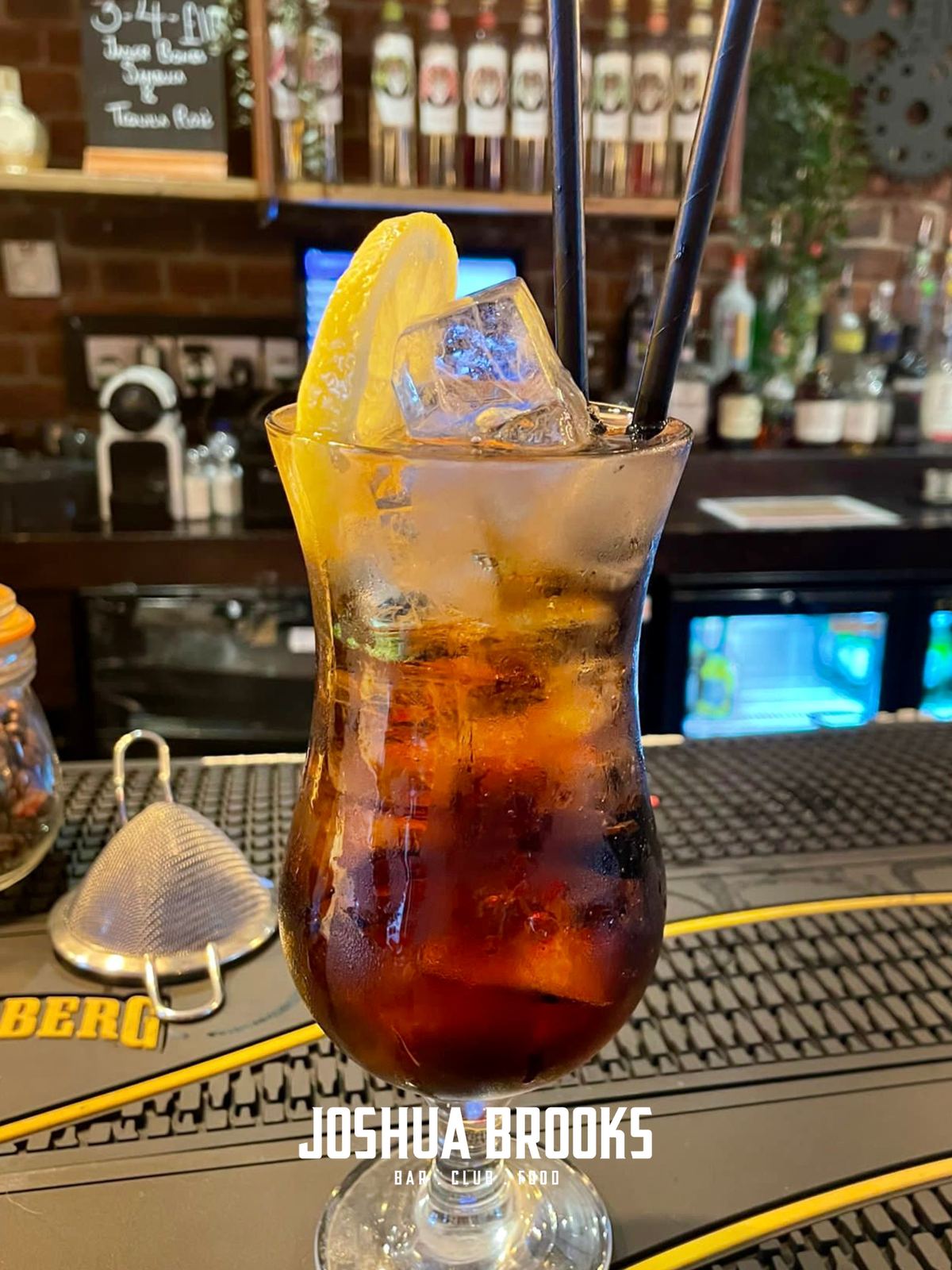 a Long Island Iced Tea on the bar at JB's