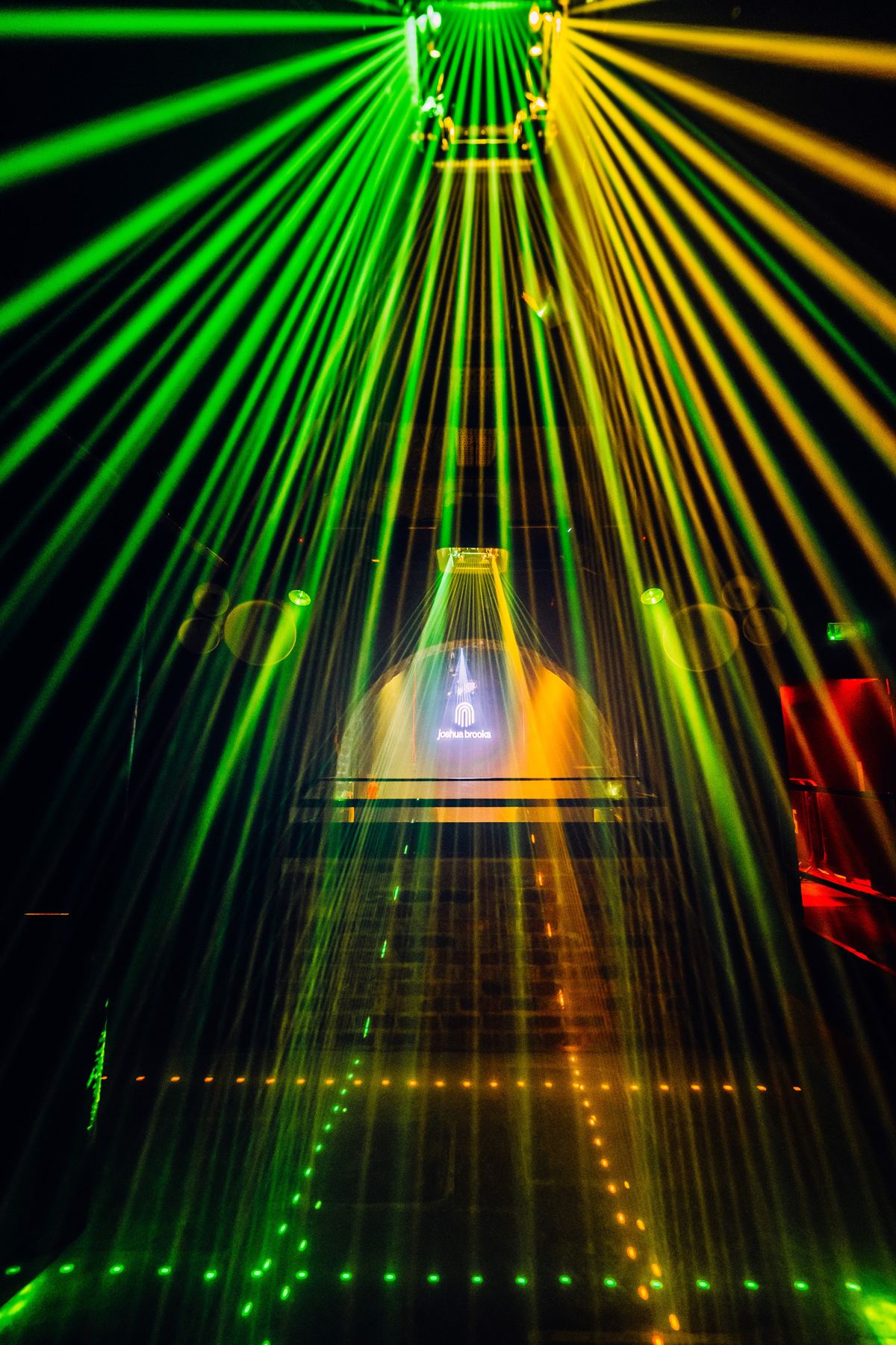 green and yellow lasers over the basement floor
